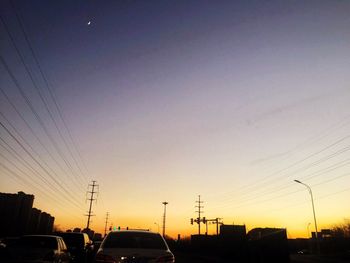 Electricity pylon at sunset