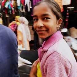 Portrait of smiling young woman