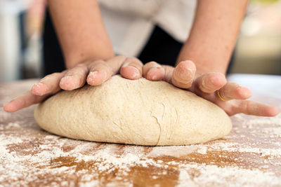 Close-up of person preparing food