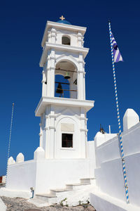 Low angle view of building against blue sky