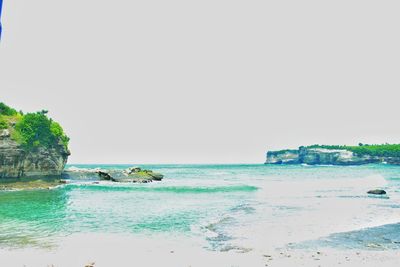 Scenic view of sea against clear sky