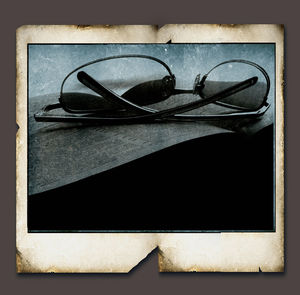 Close-up of sunglasses on table