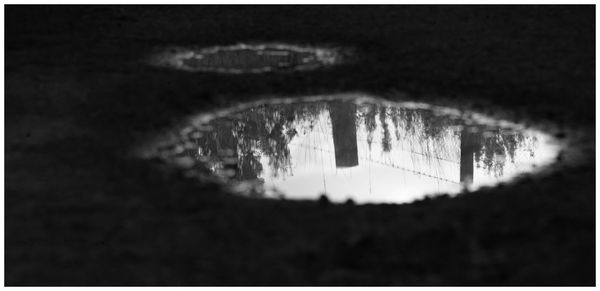 Reflection of man on mirror