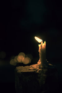 Close-up of lit candles on birthday cake