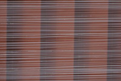 Full frame shot of plastic wrapped building materials.