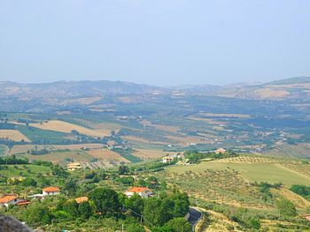 Landscape with mountain range in background