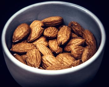 High angle view of roasted coffee on black background