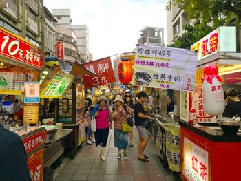 Group of people in market