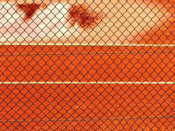 Running track seen through chainlink fence