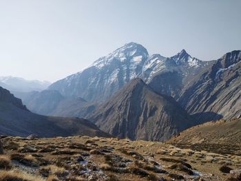 Scenic view of snowcapped mountains against sky