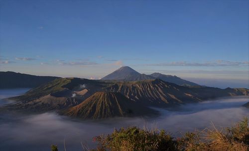 Panoramic view of volcanic landscape against sky