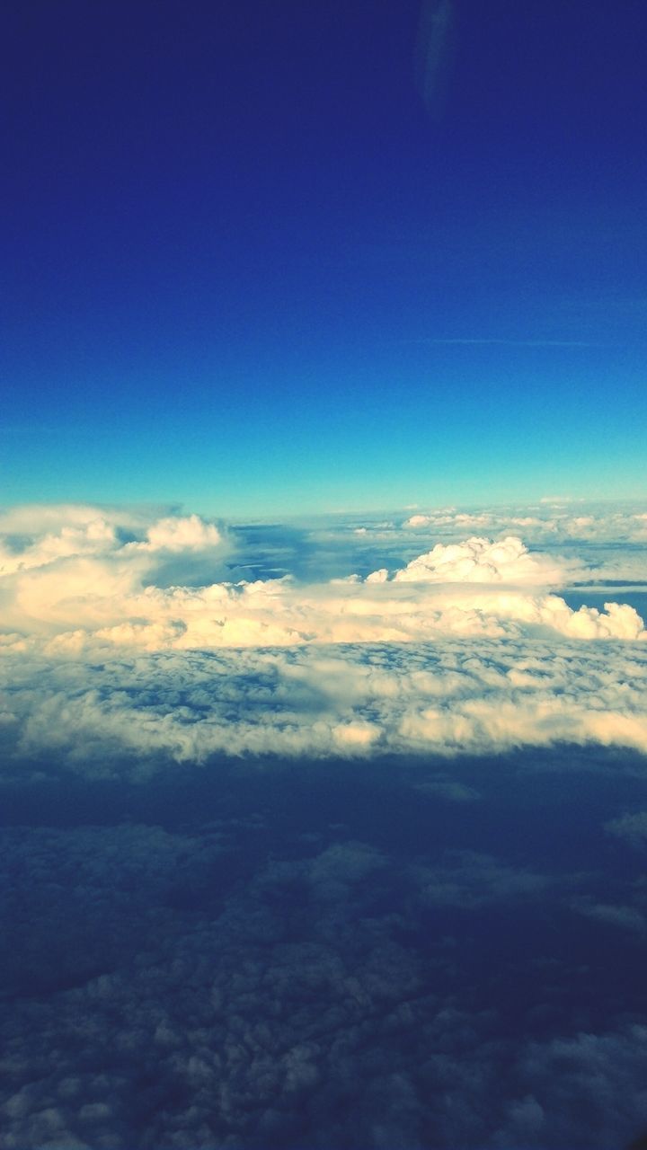 scenics, blue, beauty in nature, tranquil scene, sky, tranquility, nature, aerial view, cloudscape, cloud - sky, idyllic, cloud, majestic, landscape, sky only, copy space, outdoors, no people, day, awe