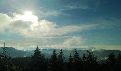 Scenic view of silhouette mountains against sky