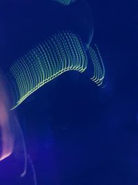 Low angle view of illuminated light against clear blue sky