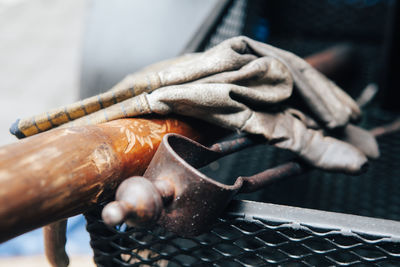 Close-up of hand holding cigarette