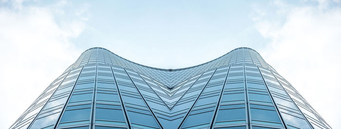 Low angle view of modern building against sky