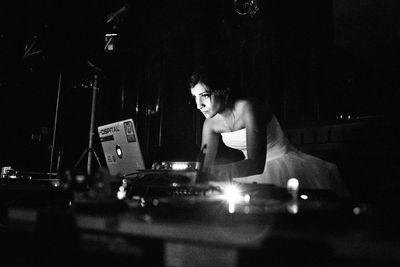 Blurred motion of woman at night