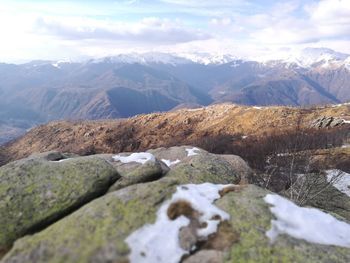 Scenic view of snowcapped mountains against sky