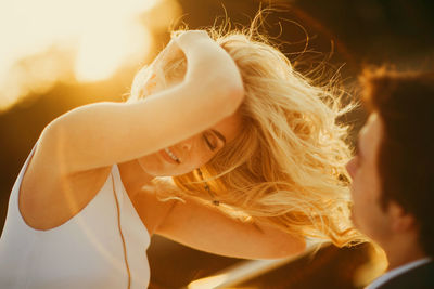 Portrait of beautiful young woman outdoors