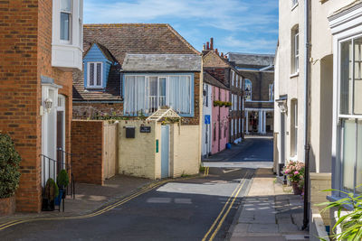 Narrow alley with buildings in background