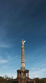 Statue of liberty against blue sky