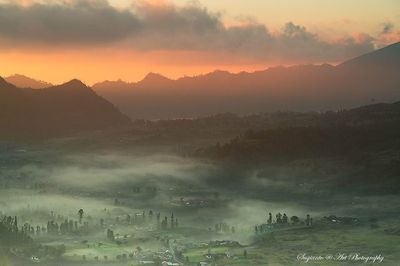 Scenic view of mountains at sunset