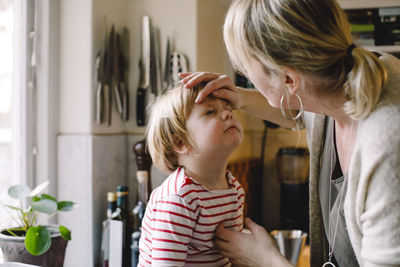 Mother and daughter at home