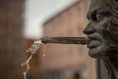 Close-up of statue of water drops