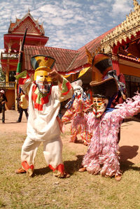 Group of people in traditional clothing during festival