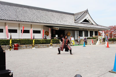 Rear view of women against sky