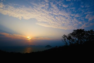 Scenic view of silhouette landscape against sky during sunset