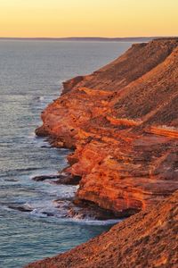 Scenic view of sea against sky at sunset