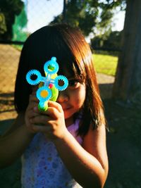 Portrait of a girl holding ice cream