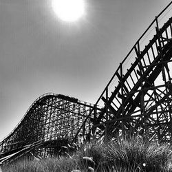 Low angle view of metal structure against sky