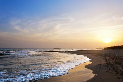 Scenic view of sea against sky during sunset