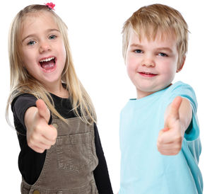 Portrait of a smiling girl over white background