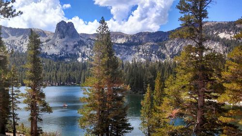 Scenic view of lake with mountains in background