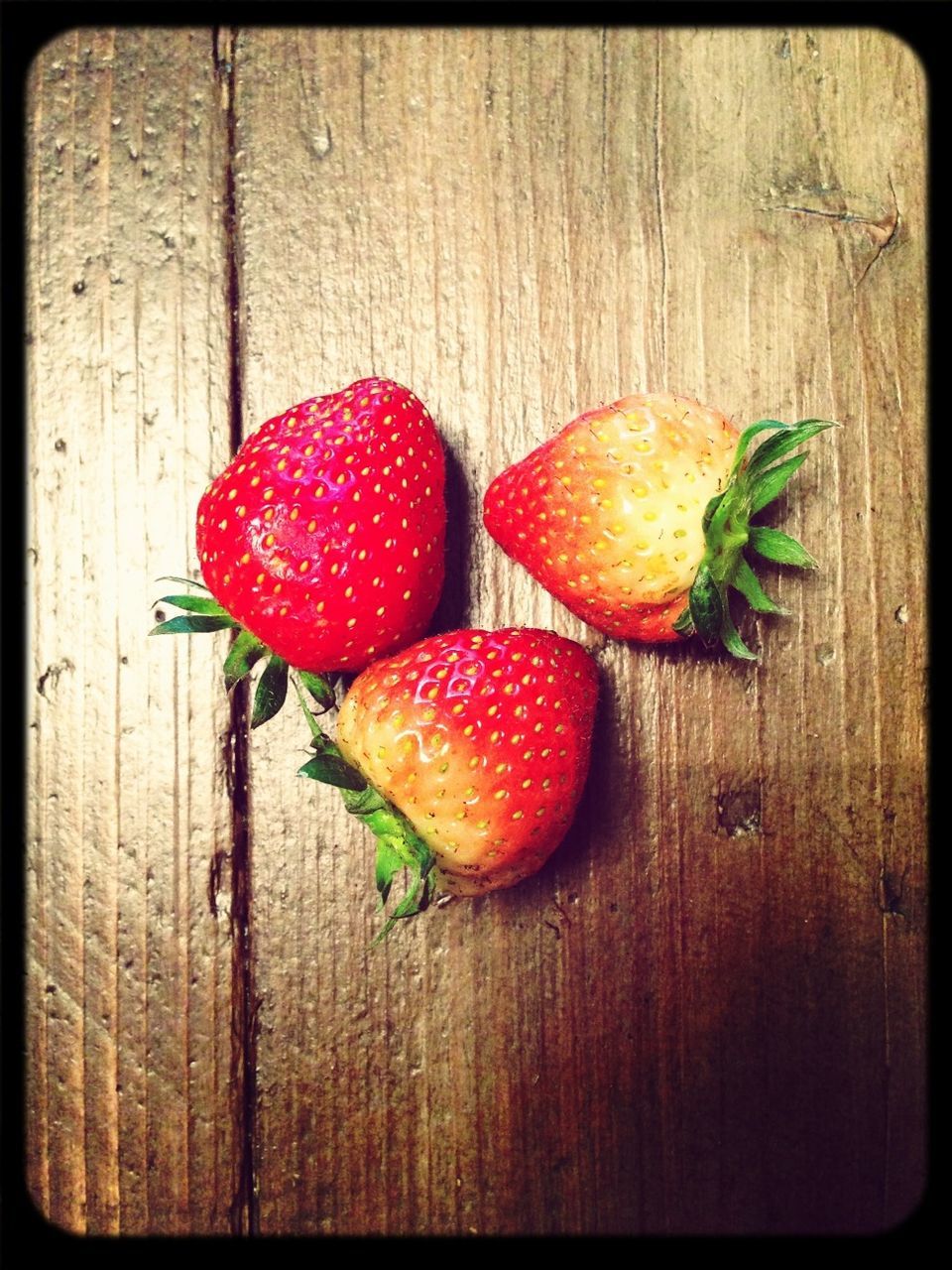 food and drink, freshness, wood - material, food, red, healthy eating, fruit, wooden, table, close-up, wood, still life, plank, high angle view, strawberry, indoors, no people, vegetable, auto post production filter, leaf