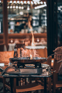 Midsection of man preparing food on table