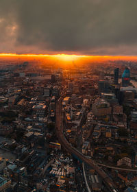 Aerial view of city at sunset