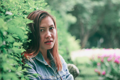 Portrait of smiling young woman outdoors