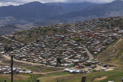 High angle view of town against mountains