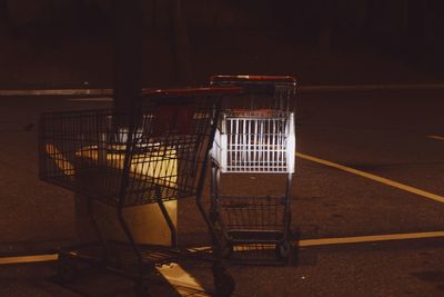 Shopping carts illuminated by headlights