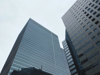 Low angle view of modern buildings against clear sky