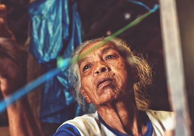Portrait of young man looking away