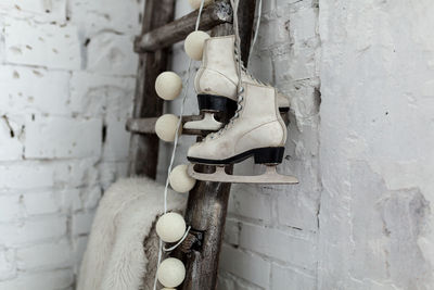 Close-up of toy hanging on wall