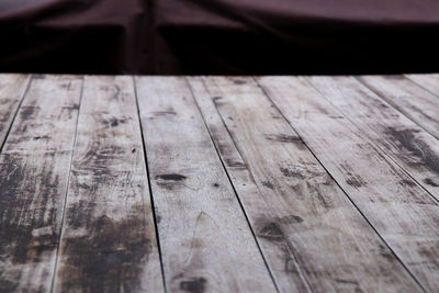 Close-up of wooden plank on hardwood floor