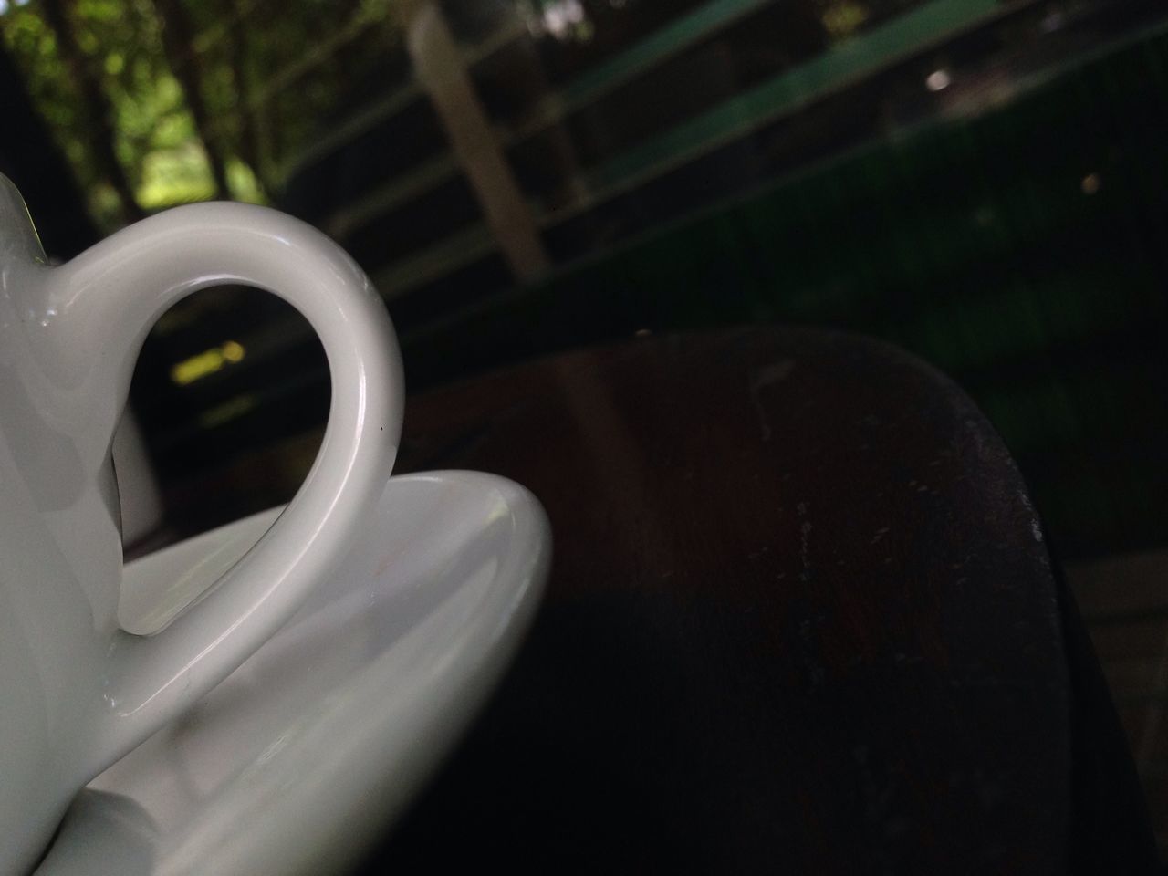 CLOSE-UP OF COFFEE CUP ON TABLE