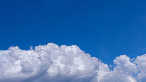 Low angle view of clouds in blue sky