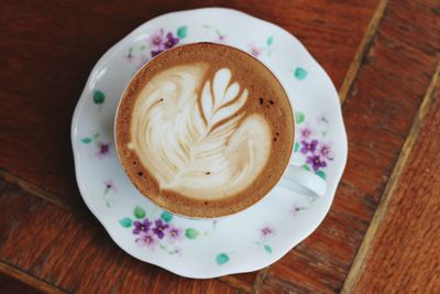 High angle view of cappuccino on table